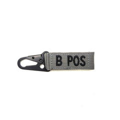 WARAGOD B+ pozitív vércsoport karabiner, szürke